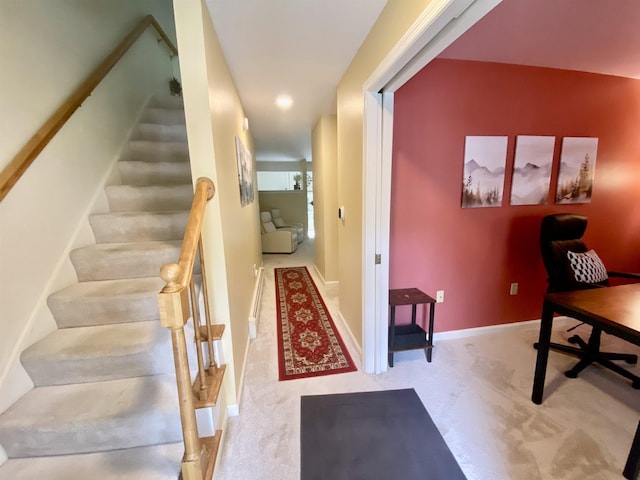 interior space featuring carpet floors, baseboards, and recessed lighting
