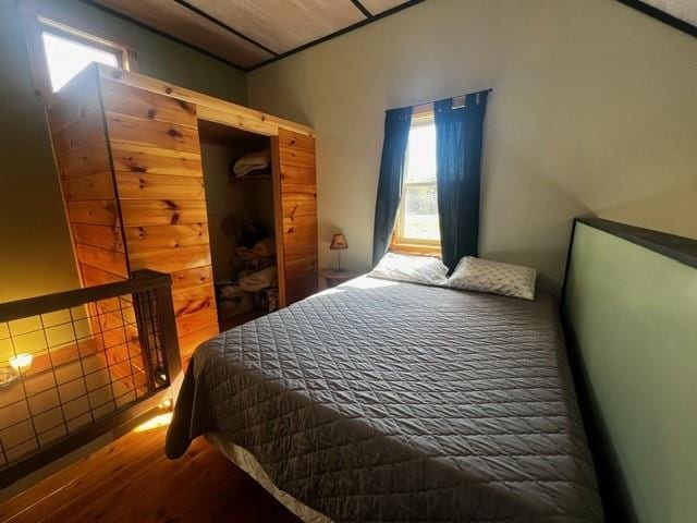 bedroom featuring wood finished floors