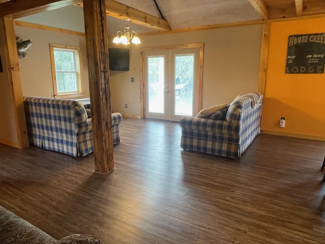 living room with baseboards, a chandelier, french doors, lofted ceiling with beams, and dark wood finished floors