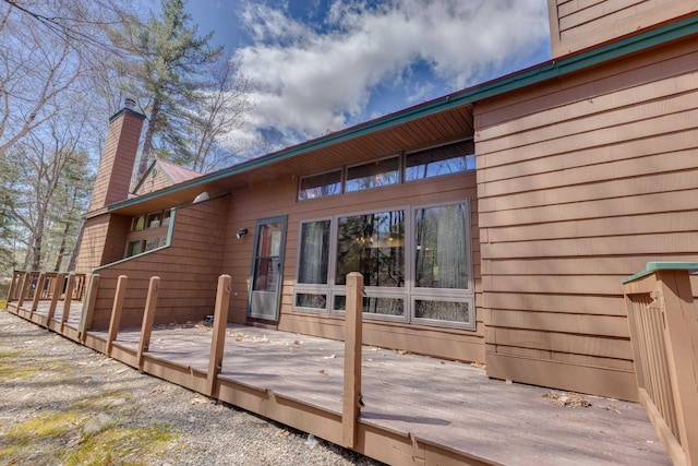 16 Riverfront Dr Unit 292, Woodstock, NH 03262 - back of property with a deck and a chimney