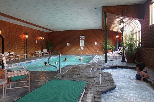 pool featuring a patio area