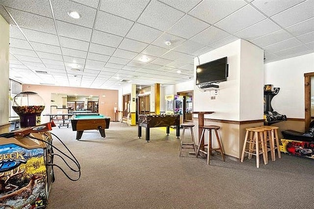 rec room with carpet flooring, a drop ceiling, and billiards