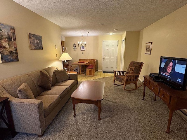 living area with light colored carpet, a textured ceiling, and a chandelier