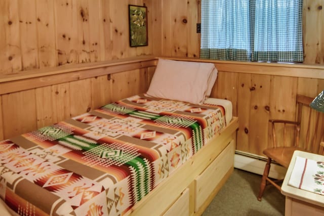 146 Dundee Rd, Bartlett, NH 03845 - bedroom featuring carpet floors, a baseboard radiator, and wood walls