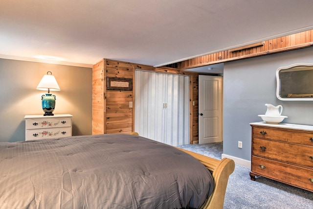 carpeted bedroom with baseboards