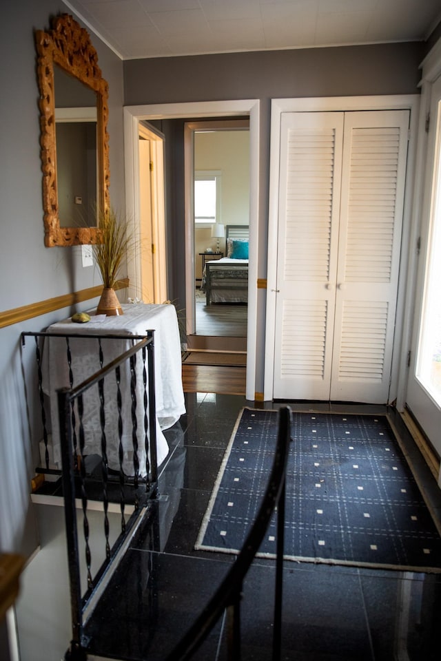 interior space featuring baseboards