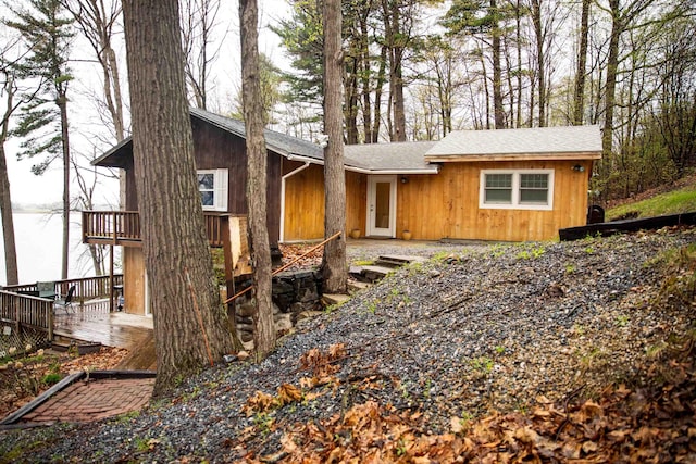 chalet / cabin featuring a wooden deck