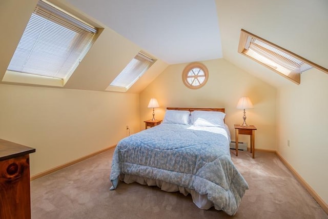 carpeted bedroom featuring baseboards, baseboard heating, and lofted ceiling with skylight