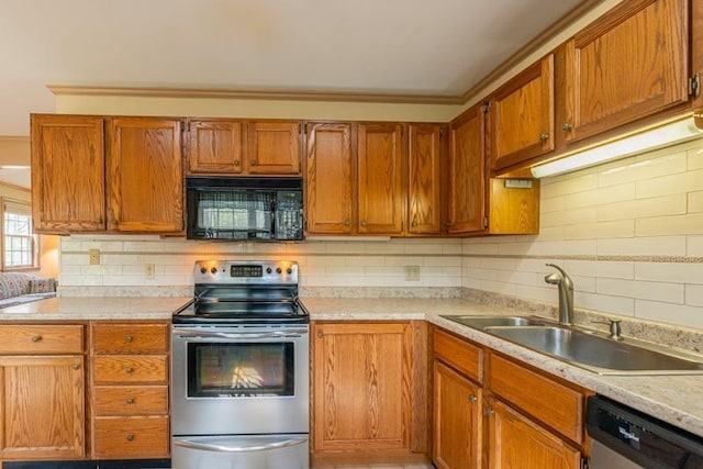 kitchen with decorative backsplash, light countertops, brown cabinets, a sink, and stainless steel appliances