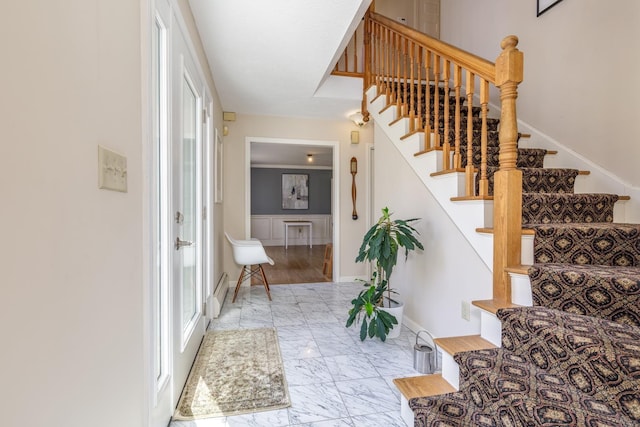 staircase with baseboards and marble finish floor