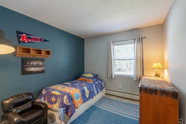 carpeted bedroom with a textured ceiling and baseboard heating