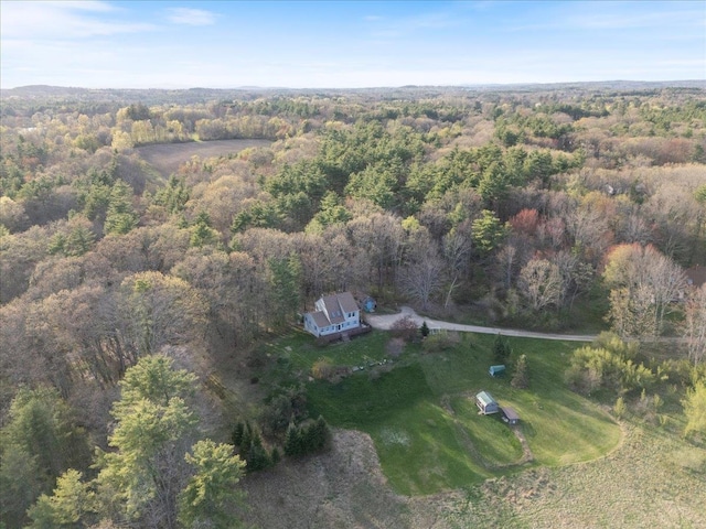 aerial view featuring a forest view