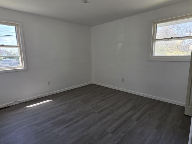 39 Gail St, Winooski, VT 05404 - spare room with baseboards and dark wood-type flooring