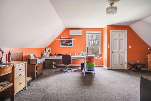 carpeted office space with vaulted ceiling, baseboards, and a wall mounted AC