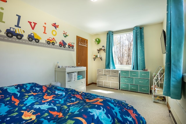 carpeted bedroom with baseboards