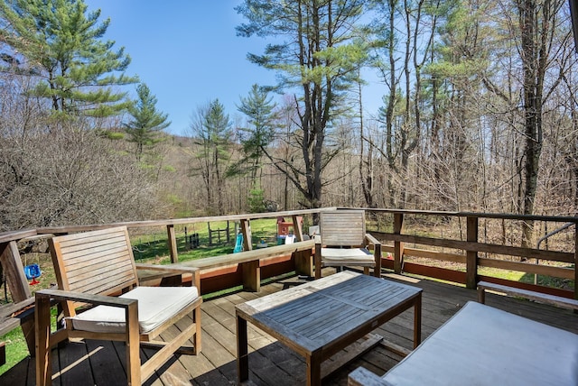 deck featuring a forest view