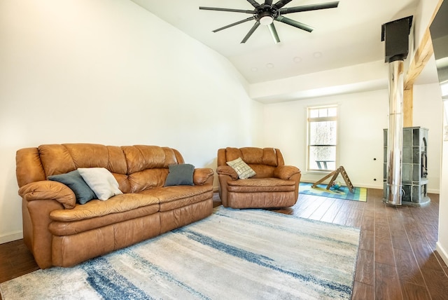 living room with dark wood finished floors, baseboards, lofted ceiling, and ceiling fan