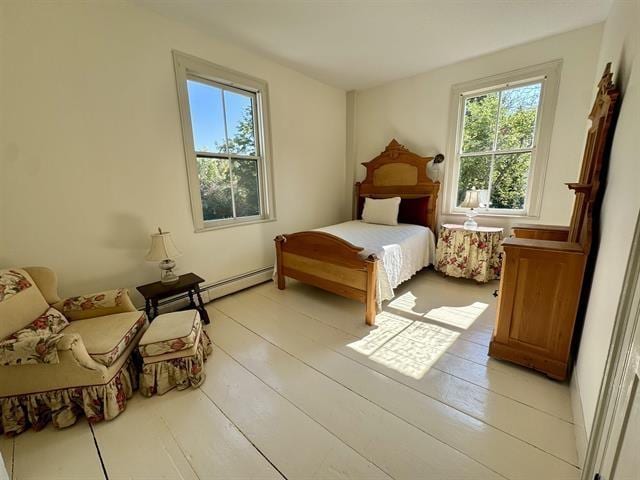 bedroom with a baseboard radiator