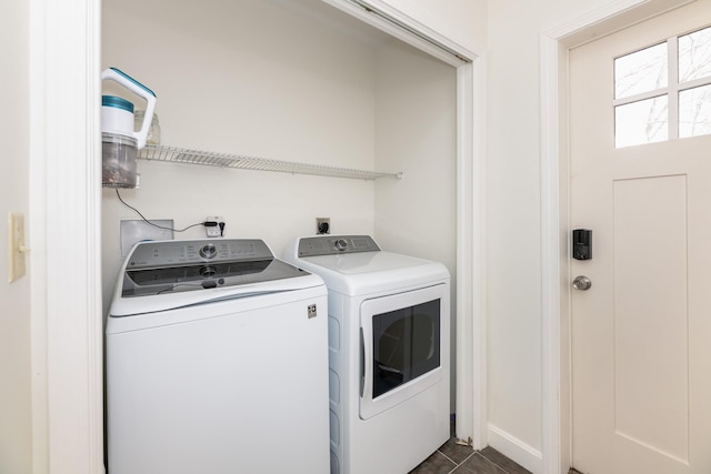 washroom featuring laundry area and independent washer and dryer