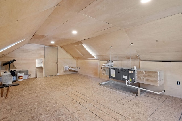 interior space with recessed lighting and vaulted ceiling