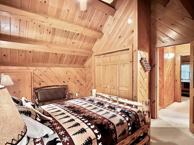 carpeted bedroom featuring wooden walls, wood ceiling, and vaulted ceiling with beams