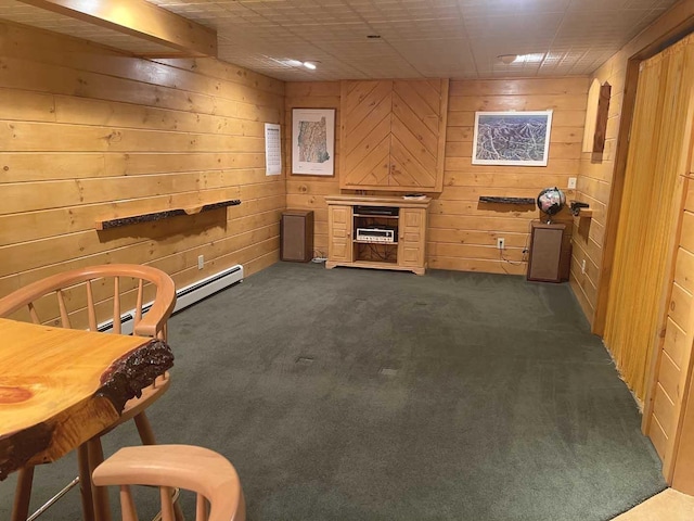 interior space with dark colored carpet and wooden walls