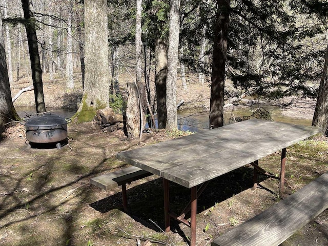 exterior space featuring a fire pit