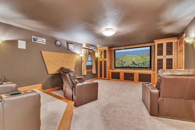 home theater featuring carpet flooring and baseboards