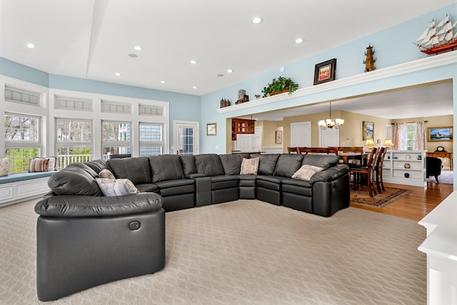 8 Palis Dr, Salisbury, MA 01952 - living area featuring a notable chandelier, light wood-style flooring, and recessed lighting