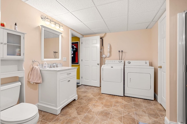 8 Palis Dr, Salisbury, MA 01952 - clothes washing area featuring washer and dryer, laundry area, and a sink