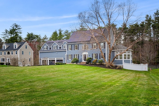 8 Palis Dr, Salisbury, MA 01952 - back of property featuring fence and a lawn