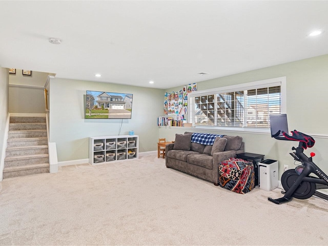 carpeted living room featuring recessed lighting, baseboards, and stairs