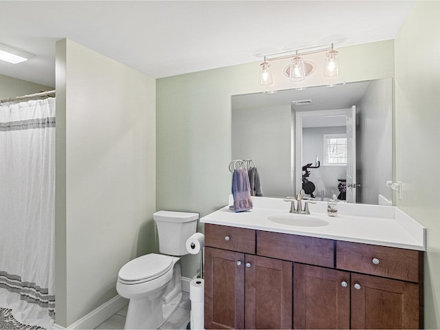 full bathroom featuring toilet, baseboards, vanity, and visible vents