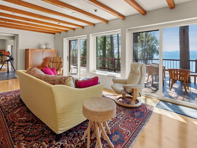25 Oakledge Dr, Burlington, VT 05401 - living room featuring a water view, wood finished floors, and beamed ceiling
