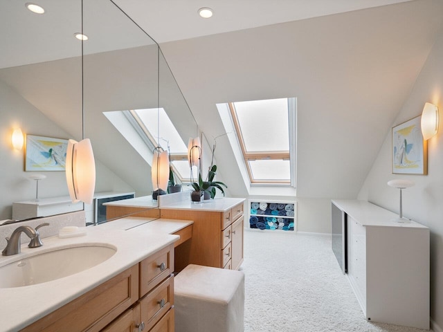 25 Oakledge Dr, Burlington, VT 05401 - full bath with vanity, vaulted ceiling with skylight, and recessed lighting