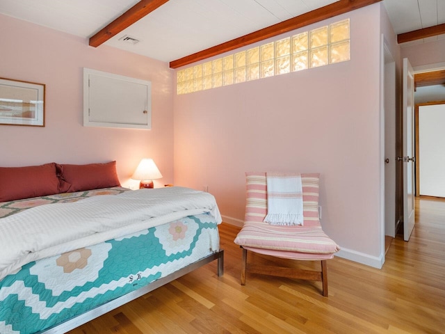 25 Oakledge Dr, Burlington, VT 05401 - bedroom with baseboards, light wood-type flooring, visible vents, and beam ceiling