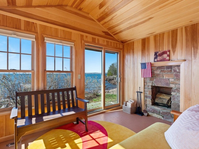 25 Oakledge Dr, Burlington, VT 05401 - living room with wooden walls, a fireplace, wooden ceiling, and vaulted ceiling