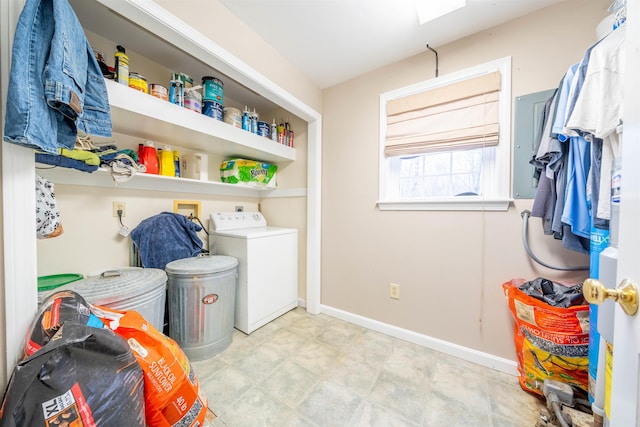 washroom with washer / clothes dryer and baseboards