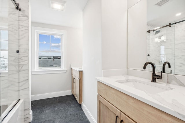full bath with baseboards, vanity, visible vents, and enclosed tub / shower combo