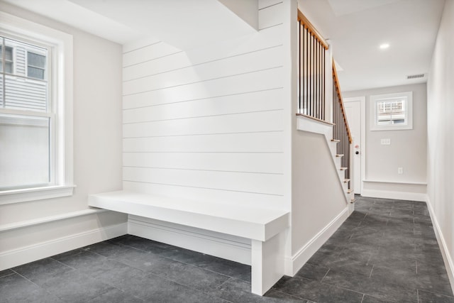mudroom with baseboards, recessed lighting, and visible vents