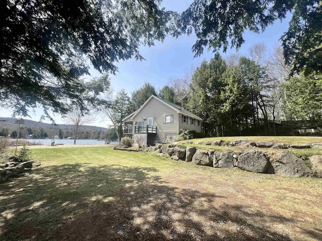 view of yard with a water view