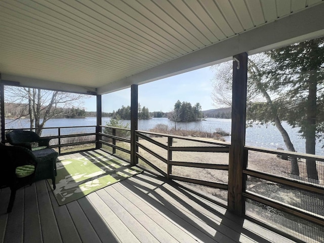 deck featuring a water view