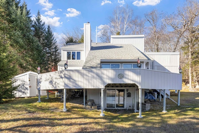 26 Private W 4, Maidstone, VT 05905 - back of property featuring a yard, a shingled roof, and a chimney