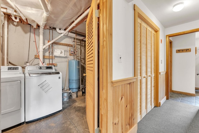 laundry area featuring separate washer and dryer and laundry area