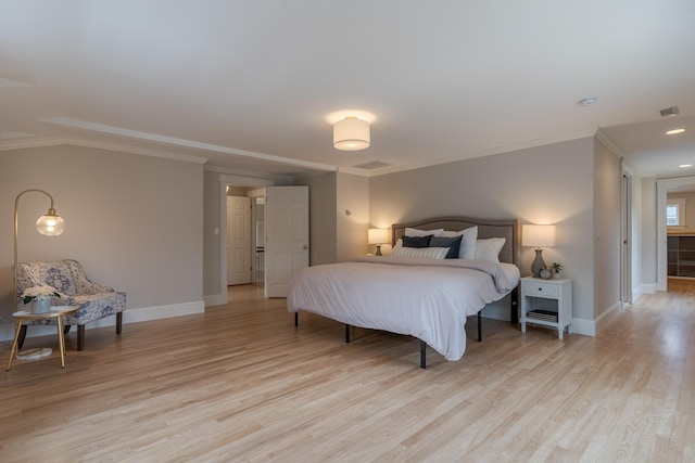 bedroom with baseboards, light wood finished floors, crown molding, and visible vents