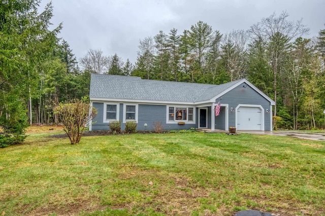 single story home with concrete driveway, a front lawn, a shingled roof, and an attached garage