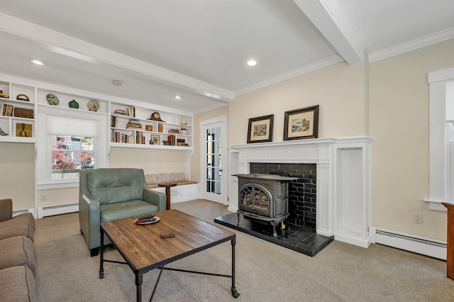carpeted living area with recessed lighting, a baseboard heating unit, ornamental molding, a wood stove, and beam ceiling