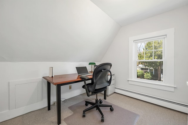 carpeted office with vaulted ceiling and baseboard heating
