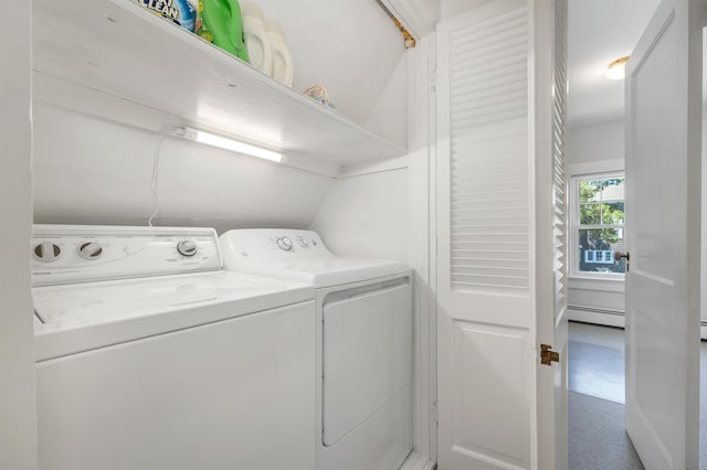 laundry room with washer and clothes dryer and laundry area