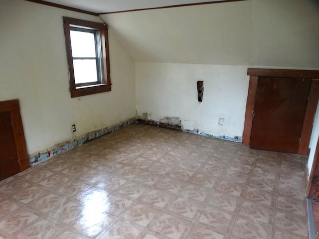 bonus room with vaulted ceiling